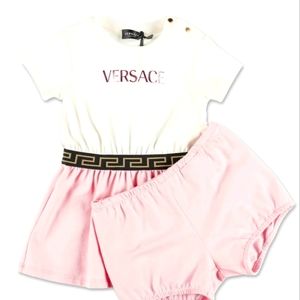 Versace cute dress 12 to 18 months worn once for pictures tags included.
